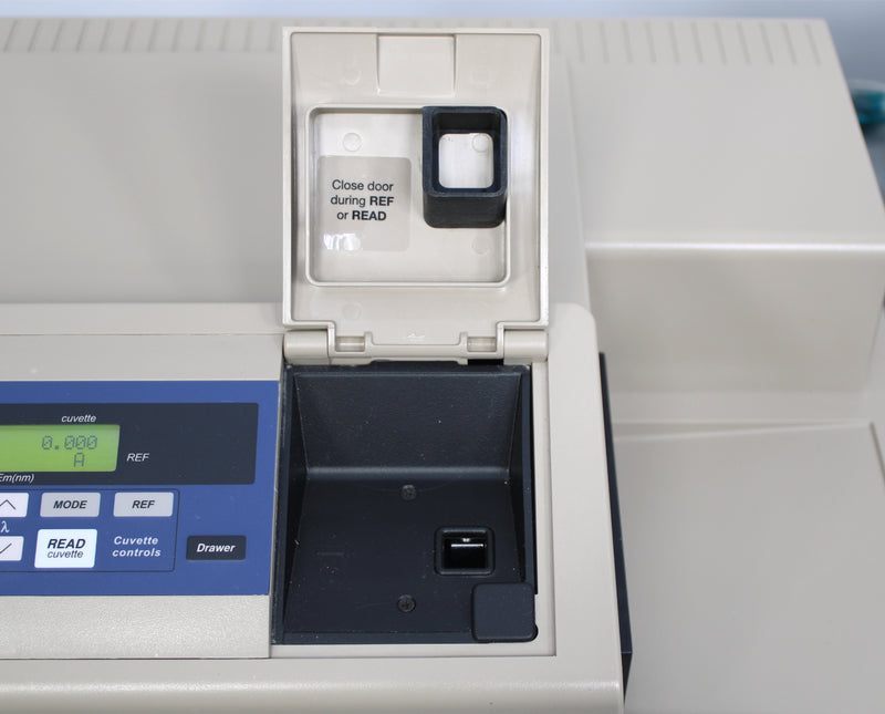 Molecular Devices SpectraMax M3 Multi-Mode Microplate Reader and Laptop
